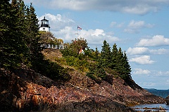 Owls Head Lighthouse Over Huge Cliffs in Maine